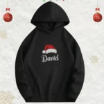 هودي كريسماس مخصص بالاسم مع قبعة سانتا – للجنسين